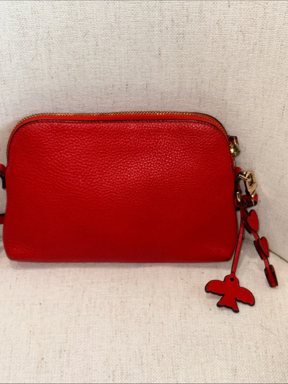 Tory Burch Red-Orange Pebbled Leather Crossbody with Heart Tassel